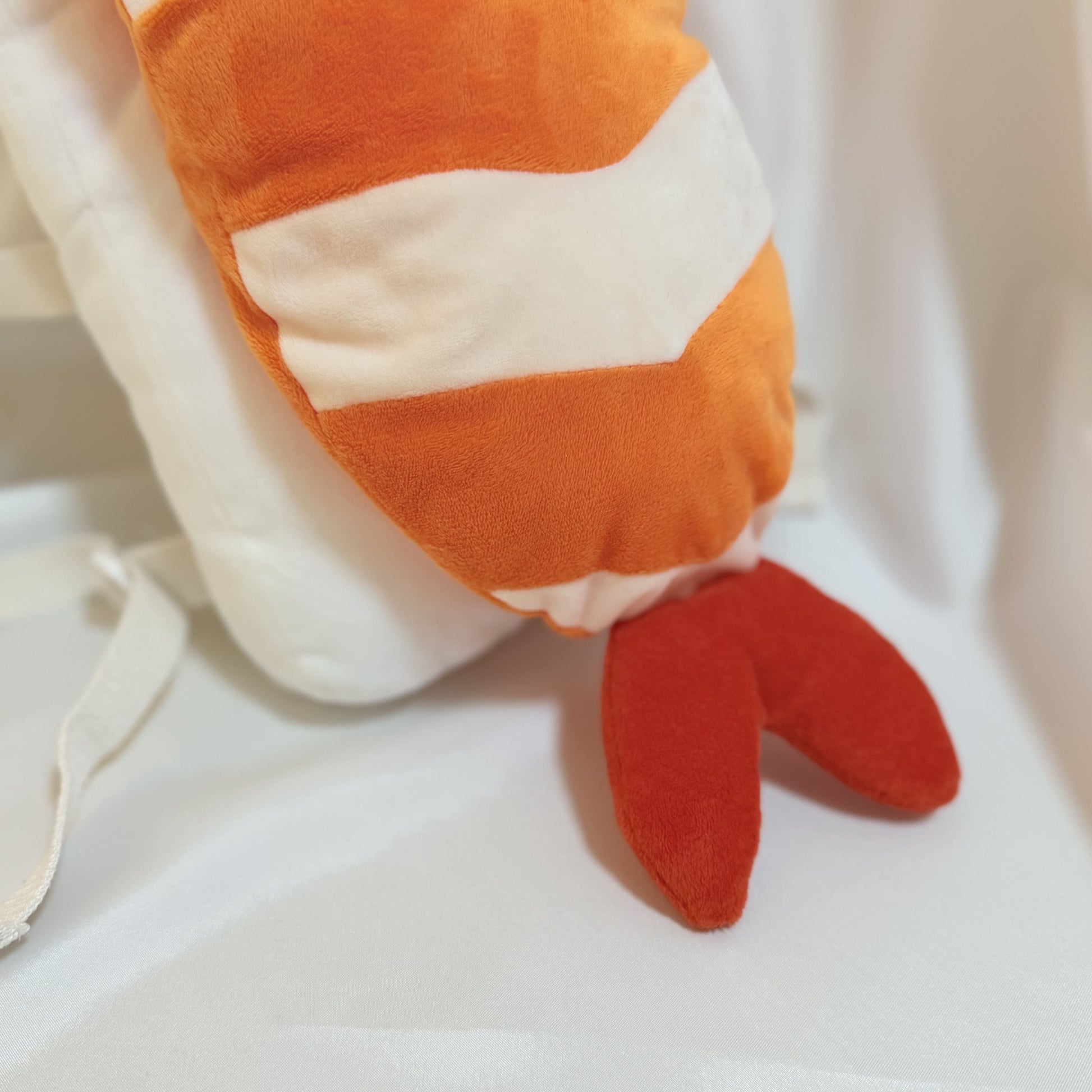 Front view of baby red shrimp head protector